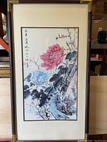 Full view of framed Chinese ink painting print with floral motif and calligraphy