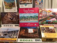 Group shot of all nine puzzle boxes