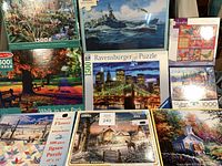 Group photo showing all nine puzzle boxes