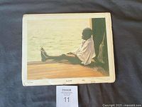 Front view of sealed Tom McKinney print with MaxSold lot tag