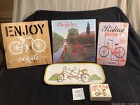 Group shot of five bicycle-themed items