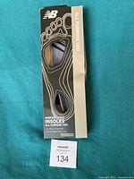 Front of box showing New Balance Performance Insoles All Purpose 1100