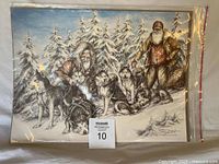 Full view of signed Doug Lindstrand sled dog print in protective sleeve