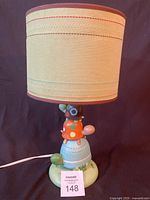 Full view of lamp with shade and power cord