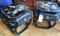 Pair of octagonal side tables painted with floral and bird designs, black lacquer finish, showing chips and scratches