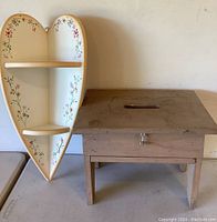 Photo of heart-shaped wooden wall shelf and wooden step stool side by side.