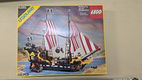 Front of original box showing artwork of assembled ship, Legoland and Lego branding, set number and piece count