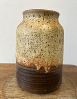 Front view of the mid-century modern ceramic vase with lava glaze showing the textured glaze surface and color transition from light to dark.