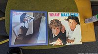 Front covers of two vinyl LP albums: Wham! Make It Big and Pat Benatar, showing artists on covers