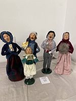 Front view of all five Byers' Choice caroler figurines