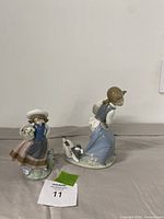 Both Lladro figurines side by side
