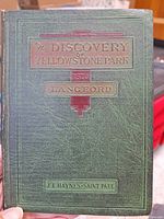 Front cover of the hardcover book showing the title 'The Discovery of Yellowstone Park' with the author's name Langford, published by J.E. Haynes - Saint Paul.