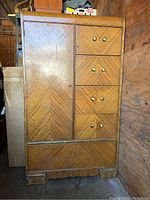 Full front view showing left door and right column of four drawers