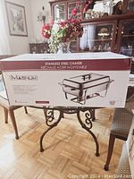 Boxed Magnum stainless steel chafer with product image and branding on packaging