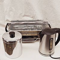 Full lot showing Farberware broiler in back, Ransburg canister in front left, and Salton kettle front right