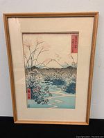 Full front view of framed print showing mat, frame, and complete composition