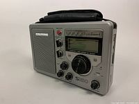 Side angled view showing overall condition, speaker, and dial controls.