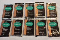 10 sealed factory packs of 1992 NHL Parkhurst hockey cards, black and copper packaging with green logo
