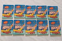 Top view showing 10 sealed 1991-92 O-Pee-Chee hockey card packs laid out.