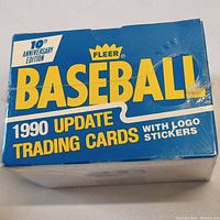 Front view of sealed blue box labeled Fleer Baseball 1990 Update Trading Cards with Logo Stickers, 10th Anniversary Edition.