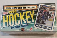 Box of 1990 Topps NHL Hockey Picture Cards sealed in factory packaging showing front with card image of Bill Ranford.