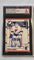 Front view of graded Curtis Joseph rookie card showing card in protective slab with clear grade label
