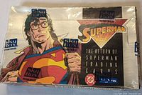 Front view of the factory sealed box with Superman artwork and branding.