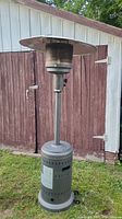 Front view of the patio heater showing full height, reflector top, stem and base