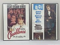 Full view of framed Casablanca and Rebel Without A Cause posters side by side, showing overall condition and framing.