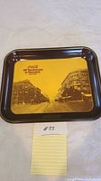 Full view of Coca-Cola 60th Anniversary Vancouver drink tray showing vintage street scene and logos.