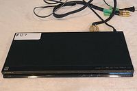 Front view of Sony BDP-S280 Blu-ray DVD player showing slim design and brand marking.