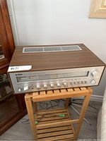 Top view of Yamaha CR-600 receiver showing woodgrain casing and ventilation grill.