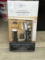 Box of Mainstays Double Hanging Closet Organizer showing brand, product name, and basic dimensions