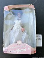 Vintage Dream Bride Barbie doll dressed in white bridal gown in original box.