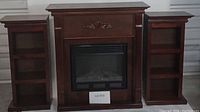 Three-piece electric fireplace with two side bookshelves