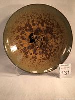 Full view of round platter showing overall color and crystalline glaze pattern
