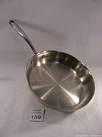Full view of vintage Lagostina stainless steel deep-sided sauté pan showing interior, handle, and pan shape.
