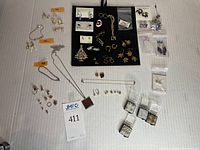 Overhead view showing all pieces on white background, sections labeled 14k and 925