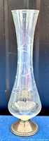 Full view of the vintage Duchin crystal trumpet-shaped vase showing the etched crystal design and sterling silver base.