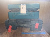 Overall view of the stacked Makita and Bosch tool cases