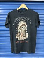 Front view of the black Yeezus tour t-shirt with skull and headdress graphic and text 'YEEZUS' and 'GOD WANTS YOU'.