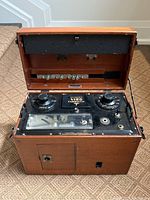 Vintage Sanborn Viso Cardiette Model 51 EKG machine inside its open wooden case showing dials and chart recorder.