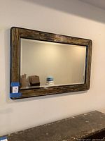 Full front view of the rectangular mirror mounted on wall