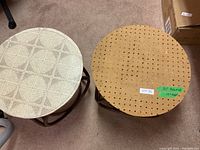 Photo of two round side tables, one with a tiled top and the other with pegboard material on top showing measurements.