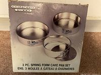 Box showing 3-piece springform cake pan set Concept 2000 brand with product image and labeling.