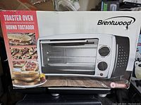Photo of Brentwood toaster oven box showing model TS-345B and product image