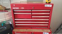 Front view of red Craftsman 8-drawer tool chest