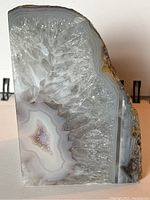 Full view of the amethyst geode showing the crystal surround and natural layers.