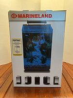 Front view of the Marineland portrait aquarium box showing product image and branding.