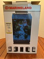 Front of Marineland aquarium box showing product image and branding.
